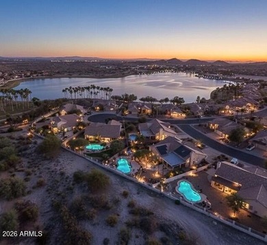 A Botanical Masterpiece Backing to Estrella's Twin Lakes. Set on on Estrella Mountain Ranch Golf Course in Arizona - for sale on GolfHomes.com, golf home, golf lot