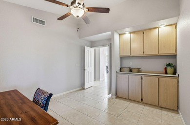 A Botanical Masterpiece Backing to Estrella's Twin Lakes. Set on on Estrella Mountain Ranch Golf Course in Arizona - for sale on GolfHomes.com, golf home, golf lot