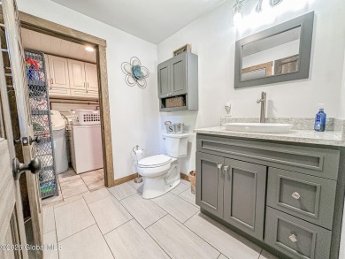 Spectacular log home offering! This immaculate 3-bed, 2.5-bath on Skene Valley Country Club in New York - for sale on GolfHomes.com, golf home, golf lot