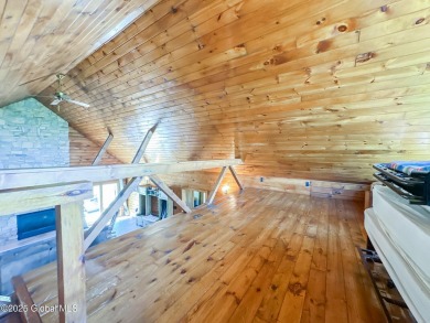 Spectacular log home offering! This immaculate 3-bed, 2.5-bath on Skene Valley Country Club in New York - for sale on GolfHomes.com, golf home, golf lot