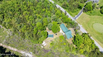 Spectacular log home offering! This immaculate 3-bed, 2.5-bath on Skene Valley Country Club in New York - for sale on GolfHomes.com, golf home, golf lot