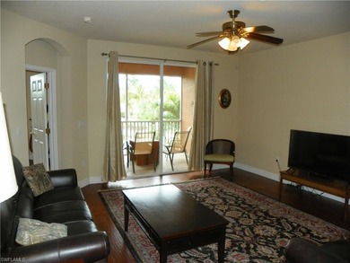 Second floor unit with lake view. Open floor plan with split on Spanish Wells Golf and Country Club in Florida - for sale on GolfHomes.com, golf home, golf lot