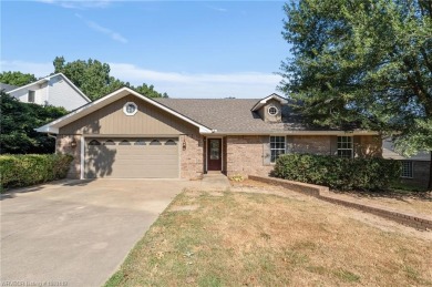 This 2,112 sq ft and 3 bed/2 bath family-friendly home is on Vache-Grasse Country Club in Arkansas - for sale on GolfHomes.com, golf home, golf lot