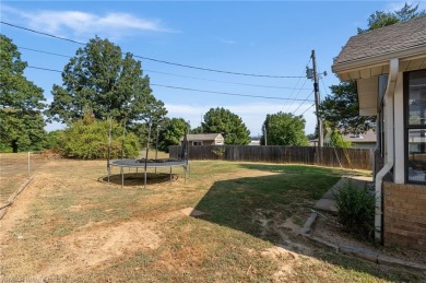 This 2,112 sq ft and 3 bed/2 bath family-friendly home is on Vache-Grasse Country Club in Arkansas - for sale on GolfHomes.com, golf home, golf lot