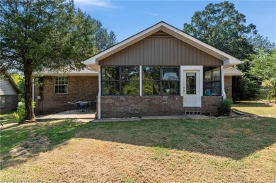 This 2,112 sq ft and 3 bed/2 bath family-friendly home is on Vache-Grasse Country Club in Arkansas - for sale on GolfHomes.com, golf home, golf lot