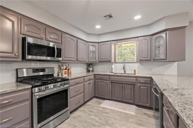 This 2,112 sq ft and 3 bed/2 bath family-friendly home is on Vache-Grasse Country Club in Arkansas - for sale on GolfHomes.com, golf home, golf lot