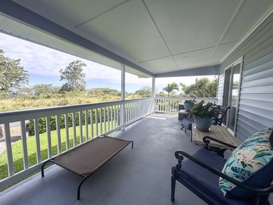 Embrace the essence of island tranquility in this charming on Discovery Harbour Golf Course in Hawaii - for sale on GolfHomes.com, golf home, golf lot