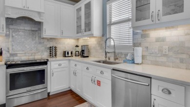 This remodeled 6BR, 3.5BA retreat sleeps 16, making it ideal for on Regatta Bay Golf and Country Club in Florida - for sale on GolfHomes.com, golf home, golf lot