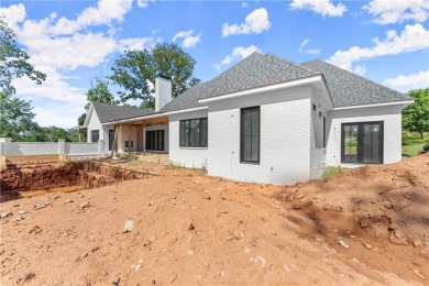 Discover refined luxury in this impeccably designed ranch estate on Manor Golf and Country Club in Georgia - for sale on GolfHomes.com, golf home, golf lot