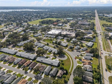 LIKE A PHOENIX, this gorgeous Sandpiper Golf  Country Club villa on Sandpiper Golf Club in Florida - for sale on GolfHomes.com, golf home, golf lot