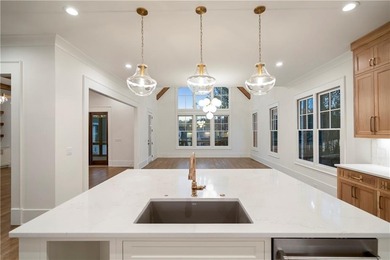 Discover refined luxury in this impeccably designed ranch estate on Manor Golf and Country Club in Georgia - for sale on GolfHomes.com, golf home, golf lot