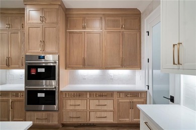 Discover refined luxury in this impeccably designed ranch estate on Manor Golf and Country Club in Georgia - for sale on GolfHomes.com, golf home, golf lot