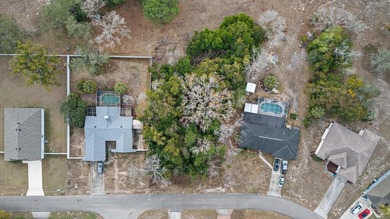 Build your dream home on this spacious 0.3444-acre homesite on Spring Hill Golf Course in Florida - for sale on GolfHomes.com, golf home, golf lot