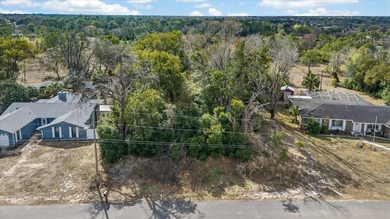 Build your dream home on this spacious 0.3444-acre homesite on Spring Hill Golf Course in Florida - for sale on GolfHomes.com, golf home, golf lot