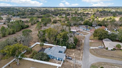 Build your dream home on this spacious 0.3444-acre homesite on Spring Hill Golf Course in Florida - for sale on GolfHomes.com, golf home, golf lot
