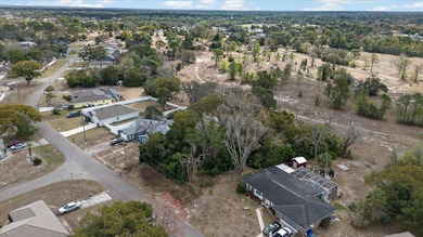 Build your dream home on this spacious 0.3444-acre homesite on Spring Hill Golf Course in Florida - for sale on GolfHomes.com, golf home, golf lot