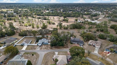 Build your dream home on this spacious 0.3444-acre homesite on Spring Hill Golf Course in Florida - for sale on GolfHomes.com, golf home, golf lot