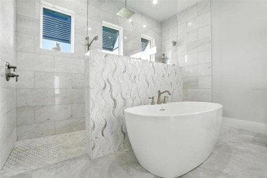 Experience the perfect blend of luxury and wellness living in on Royal Tee Country Club in Florida - for sale on GolfHomes.com, golf home, golf lot