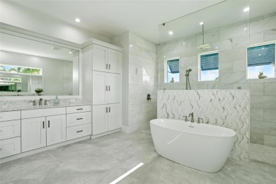 Experience the perfect blend of luxury and wellness living in on Royal Tee Country Club in Florida - for sale on GolfHomes.com, golf home, golf lot