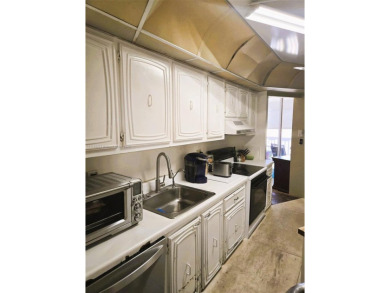 PERFECT OPPORTUNITY TO OWN A VERY LARGE 2 BEDROOM / 2 BATHROOM on Inverrary Country Club in Florida - for sale on GolfHomes.com, golf home, golf lot