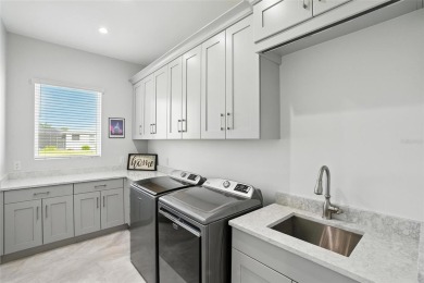 Experience the perfect blend of luxury and wellness living in on Royal Tee Country Club in Florida - for sale on GolfHomes.com, golf home, golf lot