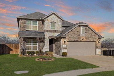 This gorgeous four-bedroom, 2.5-bath, two-story home is in a on The Golf Club At Champions Circle in Texas - for sale on GolfHomes.com, golf home, golf lot