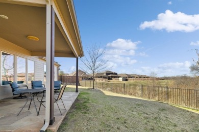 This gorgeous four-bedroom, 2.5-bath, two-story home is in a on The Golf Club At Champions Circle in Texas - for sale on GolfHomes.com, golf home, golf lot
