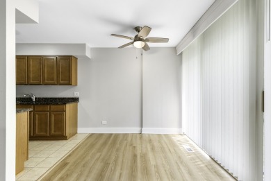 Welcome to this fabulous first-floor end-unit condo-Four Lakes' on River Bend Golf Club in Illinois - for sale on GolfHomes.com, golf home, golf lot