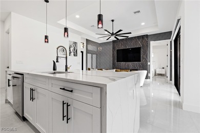 Discover refined Florida living in this exquisite 2024-built on Palmetto-Pine Country Club in Florida - for sale on GolfHomes.com, golf home, golf lot