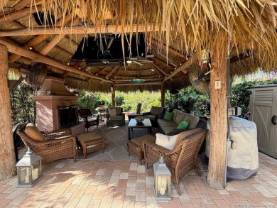 YOUR TROPICAL OASIS AWAITS! Ideally situated near the north on Motorcoach Resort Golf Course in Florida - for sale on GolfHomes.com, golf home, golf lot