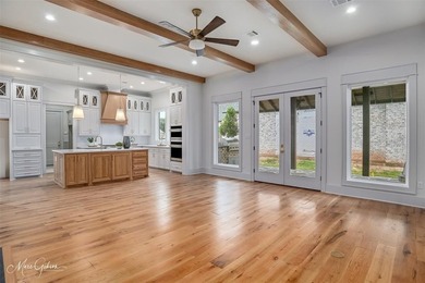This breathtaking two story home blends modern French country on The Golf Club At StoneBridge in Louisiana - for sale on GolfHomes.com, golf home, golf lot