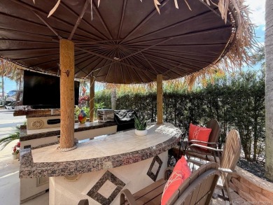 YOUR TROPICAL OASIS AWAITS! Ideally situated near the north on Motorcoach Resort Golf Course in Florida - for sale on GolfHomes.com, golf home, golf lot