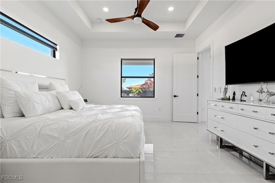 Discover refined Florida living in this exquisite 2024-built on Palmetto-Pine Country Club in Florida - for sale on GolfHomes.com, golf home, golf lot