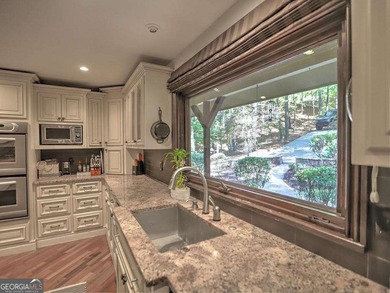 Secluded Forest Retreat in Rivermont Country Club. Nestled in on Rivermont Golf and Country Club in Georgia - for sale on GolfHomes.com, golf home, golf lot