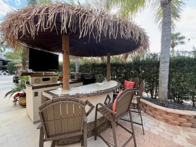 YOUR TROPICAL OASIS AWAITS! Ideally situated near the north on Motorcoach Resort Golf Course in Florida - for sale on GolfHomes.com, golf home, golf lot