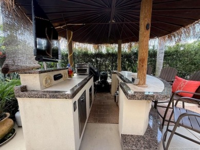 YOUR TROPICAL OASIS AWAITS! Ideally situated near the north on Motorcoach Resort Golf Course in Florida - for sale on GolfHomes.com, golf home, golf lot