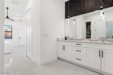 Discover refined Florida living in this exquisite 2024-built on Palmetto-Pine Country Club in Florida - for sale on GolfHomes.com, golf home, golf lot