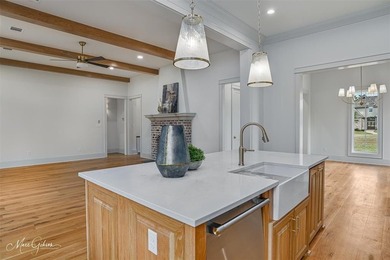 This breathtaking two story home blends modern French country on The Golf Club At StoneBridge in Louisiana - for sale on GolfHomes.com, golf home, golf lot