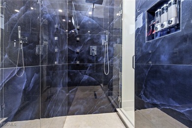 Discover refined Florida living in this exquisite 2024-built on Palmetto-Pine Country Club in Florida - for sale on GolfHomes.com, golf home, golf lot