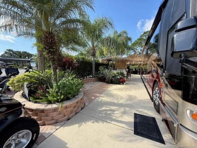 YOUR TROPICAL OASIS AWAITS! Ideally situated near the north on Motorcoach Resort Golf Course in Florida - for sale on GolfHomes.com, golf home, golf lot