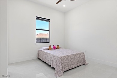 Discover refined Florida living in this exquisite 2024-built on Palmetto-Pine Country Club in Florida - for sale on GolfHomes.com, golf home, golf lot