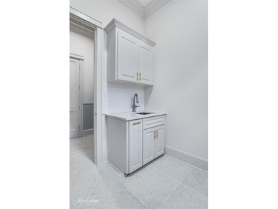 This breathtaking two story home blends modern French country on The Golf Club At StoneBridge in Louisiana - for sale on GolfHomes.com, golf home, golf lot