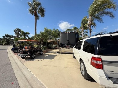 YOUR TROPICAL OASIS AWAITS! Ideally situated near the north on Motorcoach Resort Golf Course in Florida - for sale on GolfHomes.com, golf home, golf lot