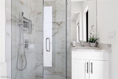 Discover refined Florida living in this exquisite 2024-built on Palmetto-Pine Country Club in Florida - for sale on GolfHomes.com, golf home, golf lot