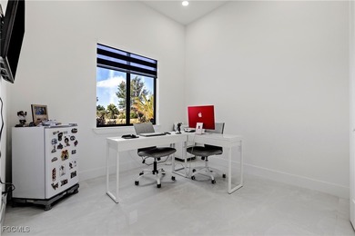 Discover refined Florida living in this exquisite 2024-built on Palmetto-Pine Country Club in Florida - for sale on GolfHomes.com, golf home, golf lot