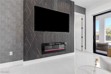 Discover refined Florida living in this exquisite 2024-built on Palmetto-Pine Country Club in Florida - for sale on GolfHomes.com, golf home, golf lot