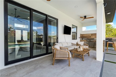 Discover refined Florida living in this exquisite 2024-built on Palmetto-Pine Country Club in Florida - for sale on GolfHomes.com, golf home, golf lot