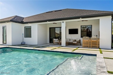 Discover refined Florida living in this exquisite 2024-built on Palmetto-Pine Country Club in Florida - for sale on GolfHomes.com, golf home, golf lot