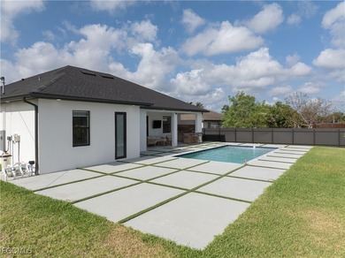 Discover refined Florida living in this exquisite 2024-built on Palmetto-Pine Country Club in Florida - for sale on GolfHomes.com, golf home, golf lot