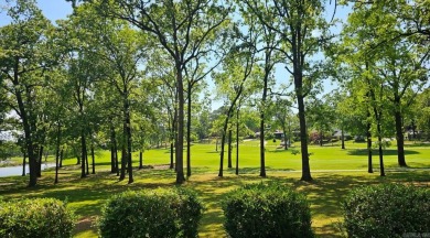 Beautiful colonial Williamsburg home sits on estate size lot on on Pleasant Valley Country Club in Arkansas - for sale on GolfHomes.com, golf home, golf lot